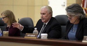 Occupational Safety & Health Standards Board Chairman David Thomas gestures during a hearing Thursday, Feb. 18, 2016, in Oakland, Calif. Condoms could be coming to porn studios across California if the state agency in charge of enforcing workplace safety adopts a new set of regulations aimed at protecting adult film actors. The state Division of Occupational Safety and Health is scheduled to vote on the regulations following a hearing Thursday in Oakland. (AP Photo/Ben Margot)